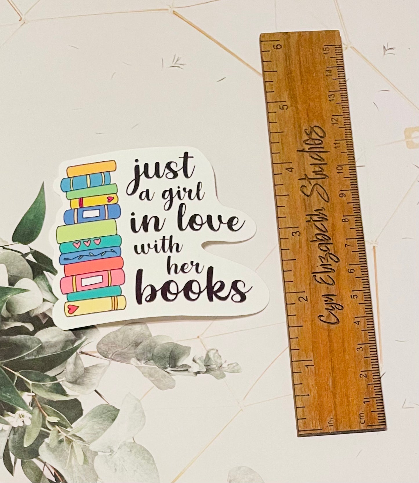 A Girl in Love with Her Books Sticker